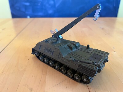 A group of four Dinky Toys Military Vehicles to include the Dinky No.699 Leopard Recovery Tank boxed