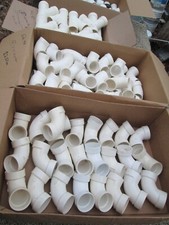 2" PVC 90 degree street elbow sch 40 DWV Charlotte - Shown in center box.