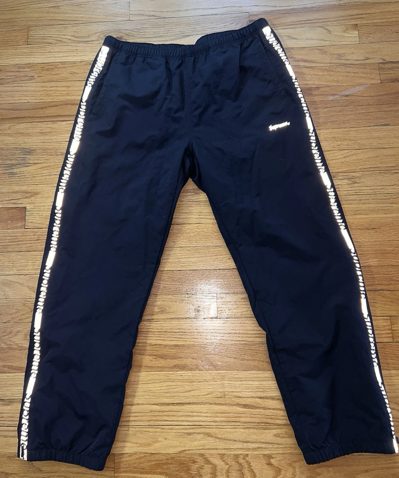 PANTALON DE SURVÊTEMENT ZIPPÉ RÉFLÉCHISSANT SUPRÊME COUPE AMPLE XL NOIR