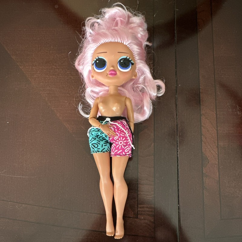 L.O.L. Surprise! O.M.G. Fashion Doll Pink Hair with Blue and Pink Shorts. No Top