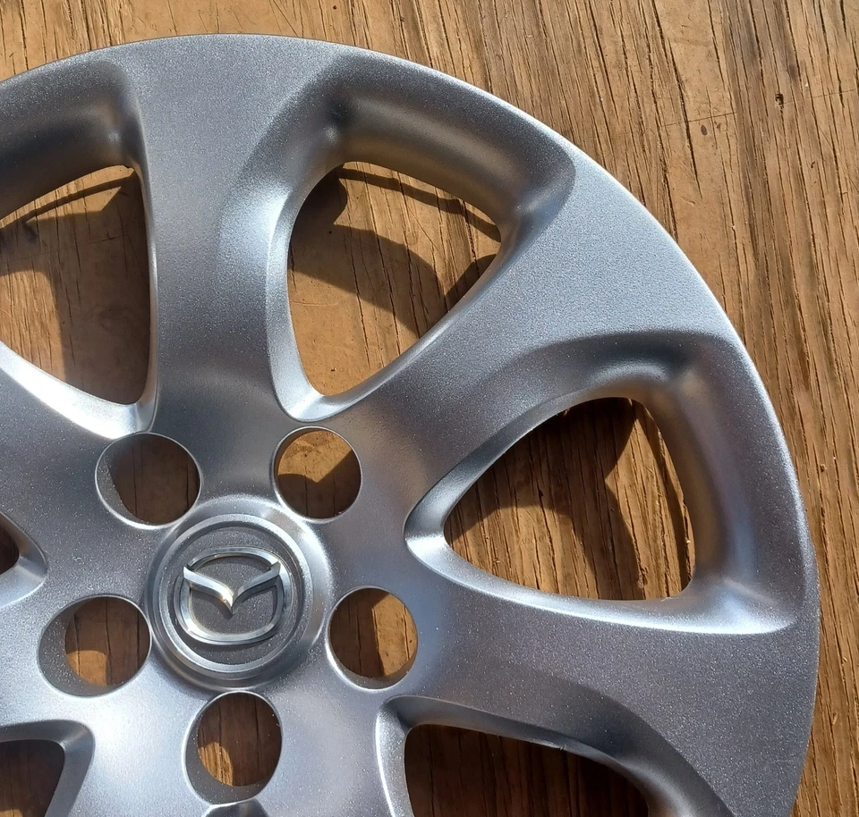 Mazda 3 hubcap 2010- 2013 fits 16" wheels, part # 56555, BBM237170 Repainted - Image 3 of 4