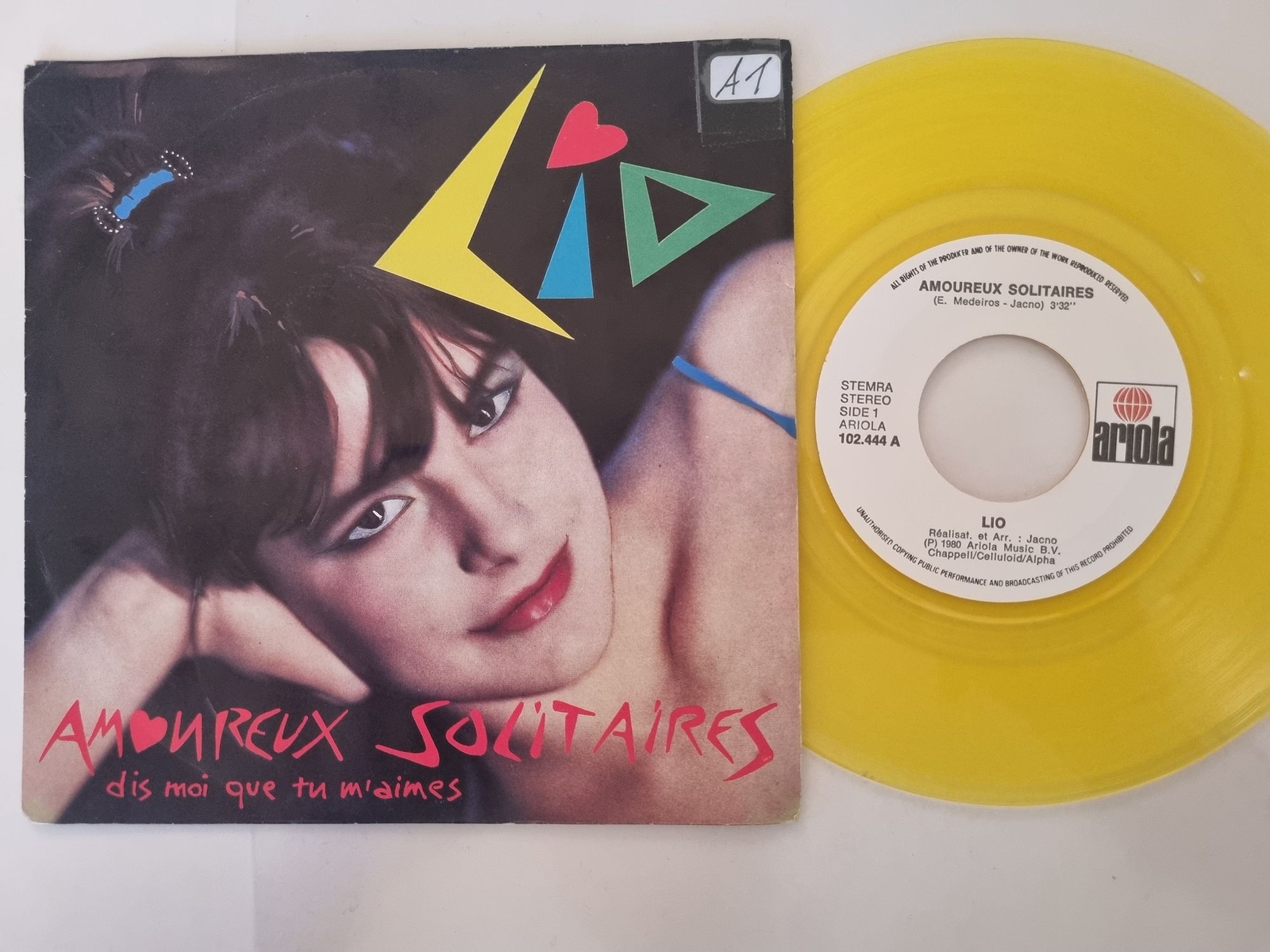 Lio - Amoureux Solitaires (Dis Moi Que Tu M'aimes) 7'' Benelux YELLOW VINYL