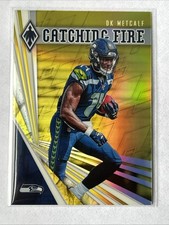 2019 Panini Phoenix - Catching Fire DK Metcalf #3 Yellow /75 Rookie Seahawks RC
