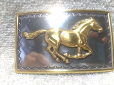 Nocona Gold Galloping Horse Buckle Gold Frame Silver Background Buckle Great