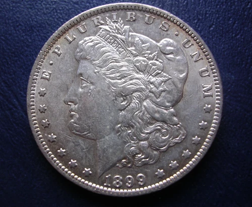 1899-O micro o AU MORGAN DOLLAR