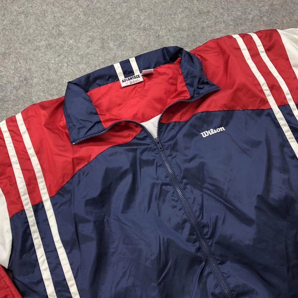 Chaqueta cortavientos vintage Wilson para hombre XL roja azul marino blanca Advantage Track años 90 Foto 3 de 4