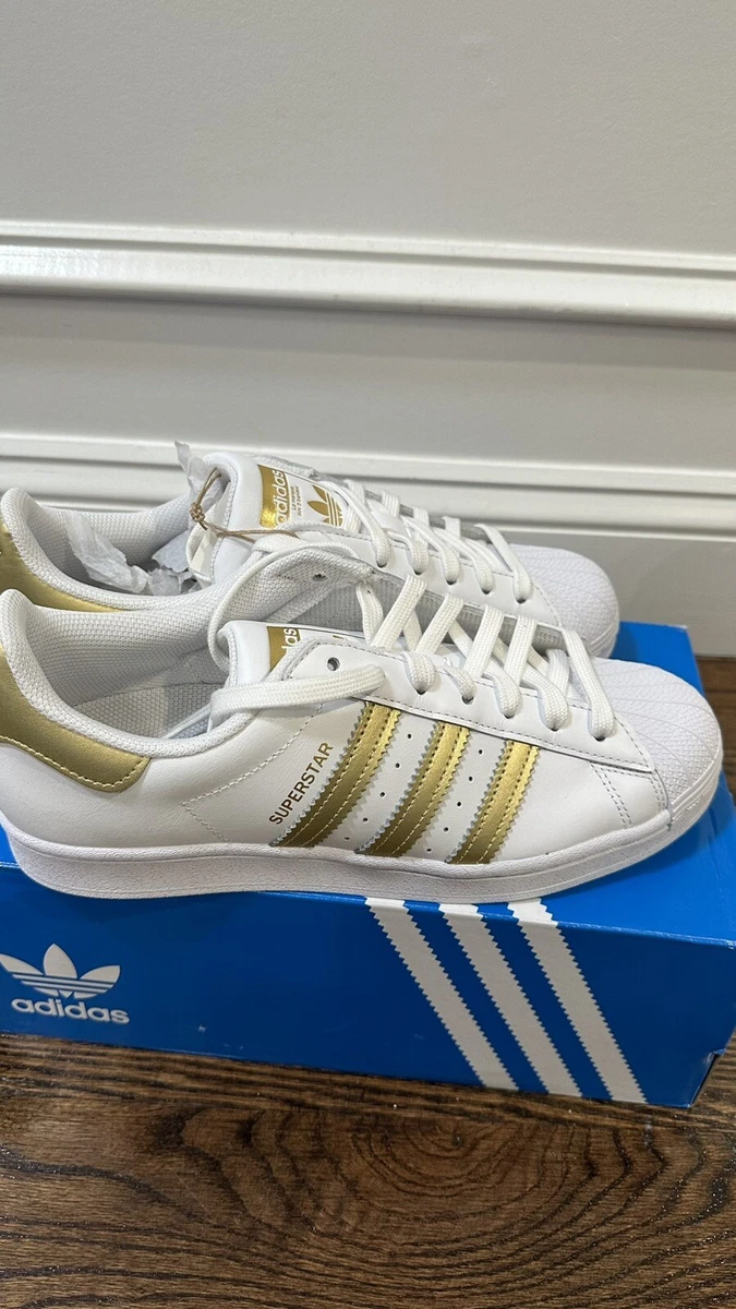 Adidas originals women's superstar sneaker gold cheap