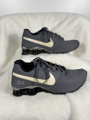 Nike Shox NZ Sneakers 7Y Men s 7 Women s 8.5 Gray Black Gold Running Shoes