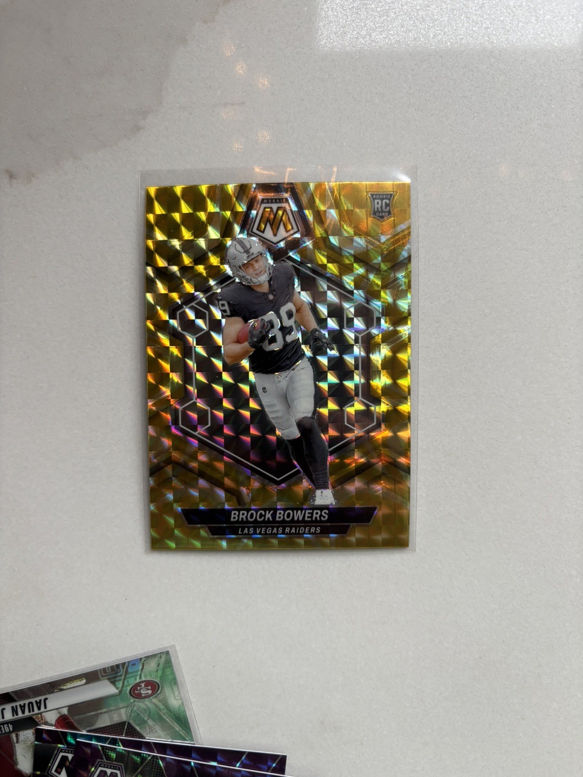 2024 Panini Mosaic - Rookies Brock Bowers #313 Reactive Yellow Mosaic Prizm (RC)