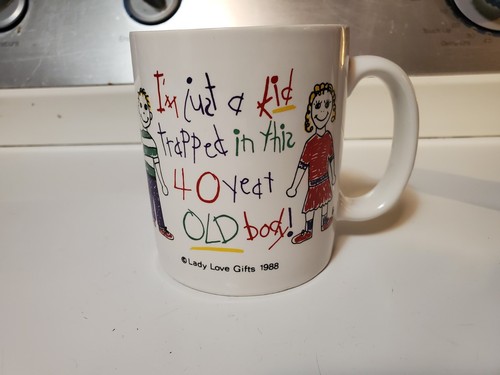 I'm just a kid trapped in this 40 year OLD body Cup/ Mug 1988 Lady Love Gifts - Picture 1 of 6