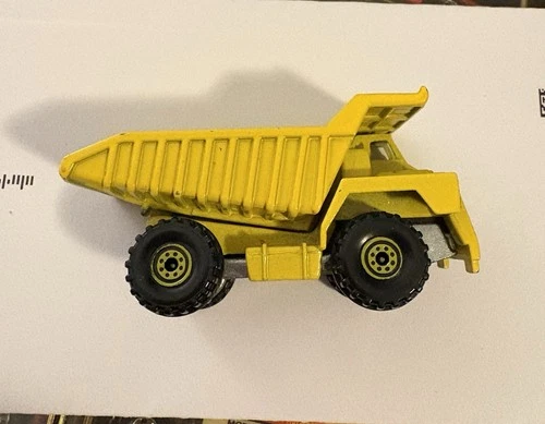 New ListingVintage 1979 Hot Wheels Workhorses Diecast Yellow CAT Dump Truck Malaysia