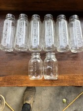 Total Of 8 Vintage Glass Evenflo Baby Bottles