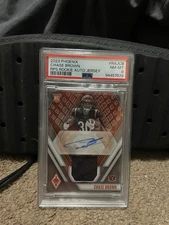 2023 Panini Phoenix - Rookie Patch AutoChase Brown #RAJ-CB Orange /149 Grade 8