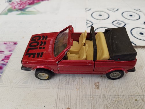 VW Golf Cabrio rotmetallic mit Friktionsmotor