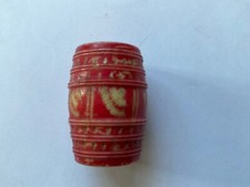 Carved and Dyed Red Sewing Thread Barrel.