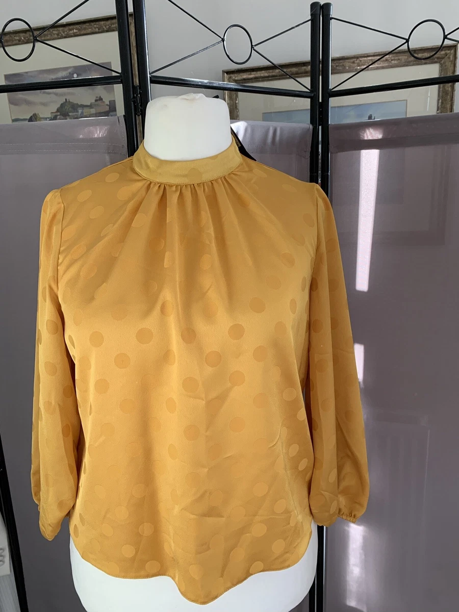 yellow bell sleeve blouse