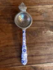 One Hundred Eighty° Elegant Tea Strainer With Enameled Blue & White Handle NWOB