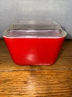 vintage Pyrex 501-B red refrigerator dish with a clear lid
