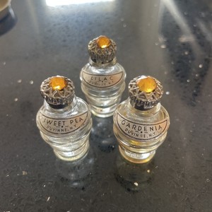 3 mini glass perfume bottles with labels and lids. Duvinne NY, 1 5/8" Tall