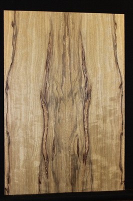 figured black limba / korina  book matched guitar  drop top.
