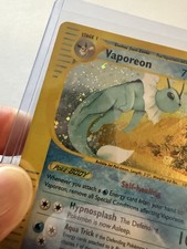 Vintage Vaporeon H31/H32 Skyridge Holo 2003  - Excellent LP- SWIRL 🩸into Tail on eBay