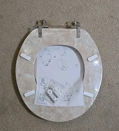 Asiento de inodoro Angel Shiold redondo beige mármol nuevo sellado en plástico - Imagen 2 de 2