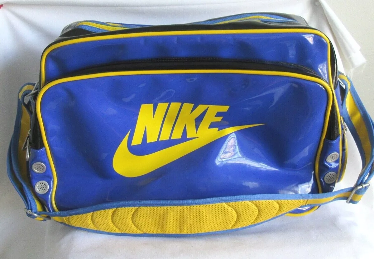 VTG RARE NIKE SWOOSH SHINY PATENT LEATHER MESSENGER BAG BLUE GOLD VTG RARE NIKE SWOOSH SHINY PATENT LEATHER MESSENGER BAG BLUE GOLD
