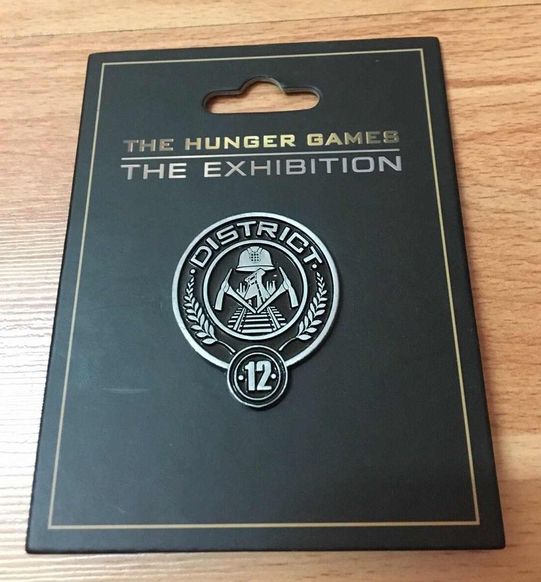 THE HUNGER GAMES EXHIBITION 'DISTRICT 12' Official Pin Prop Replica Jewelry  RARE | eBay