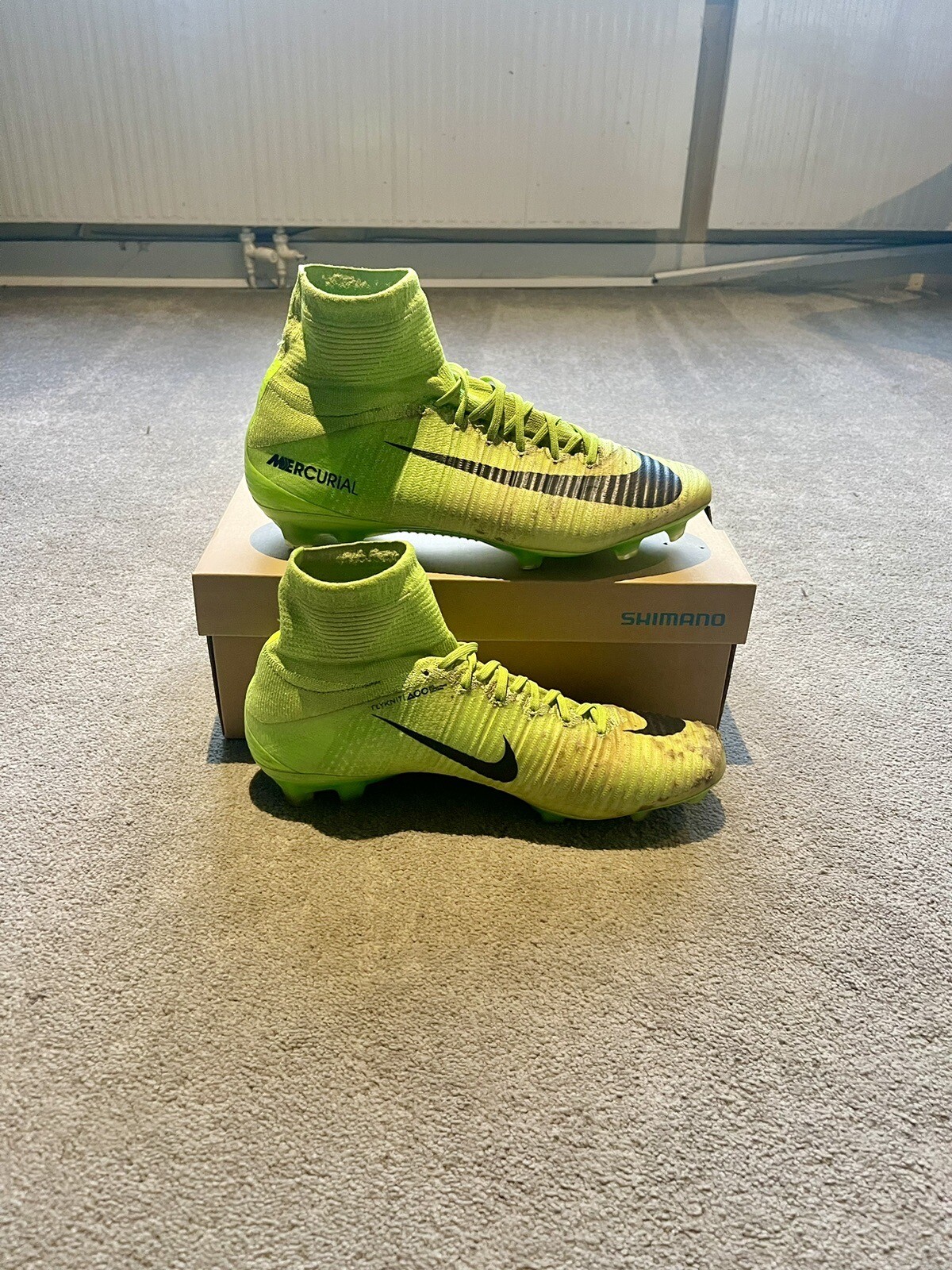 nike grey and green football boots