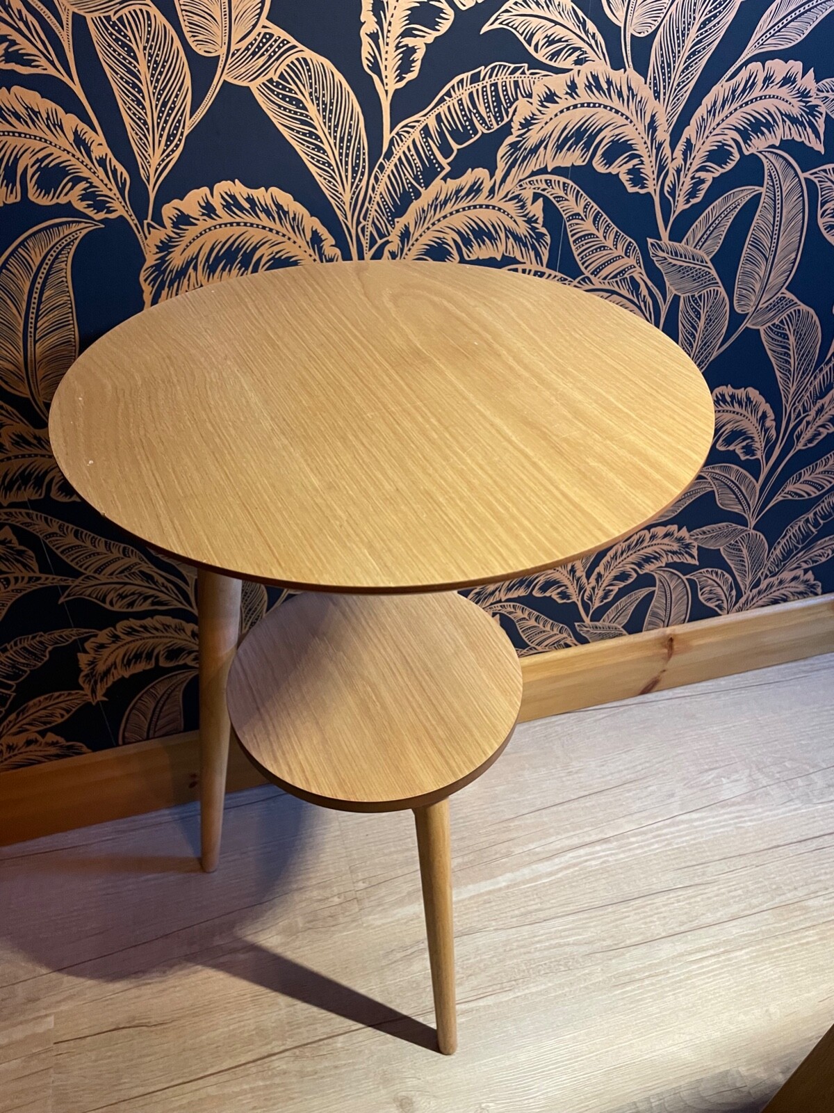 Circular wooden two tier, three legged Dias side table from Futon