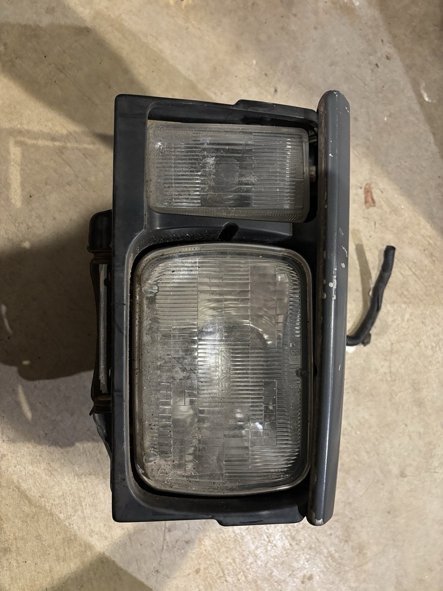 1984-1986 Nissan 300ZX Z31 LH Driver Left Front Headlight Assembly