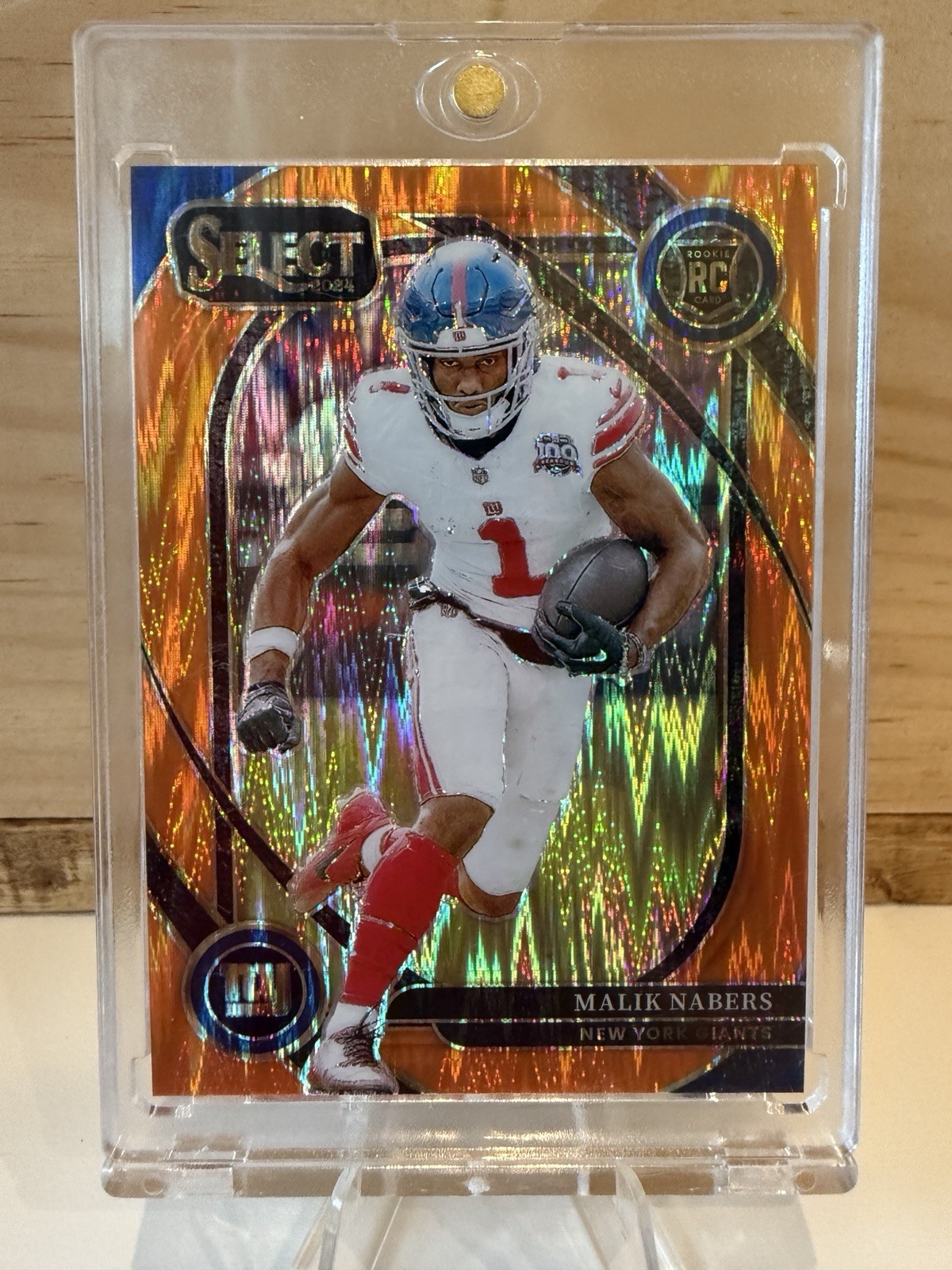 2024 Panini Select - Club Level Malik Nabers #220 Orange Shock Prizm /399 (RC)