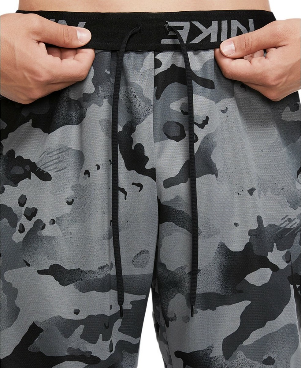 nike training shorts with camo swoosh in black