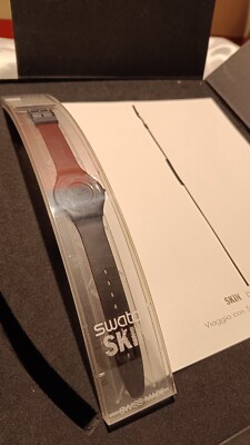 Swatch Primo Skin schwarz mit Buch zeigt Deck wunderschön
