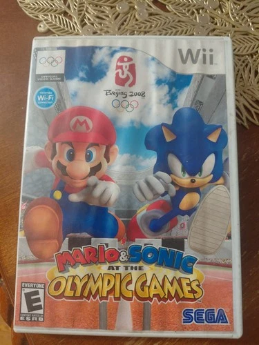Mario & Sonic at the Olympic Games - Nintendo Wii + Mario Super Sluggers Free
