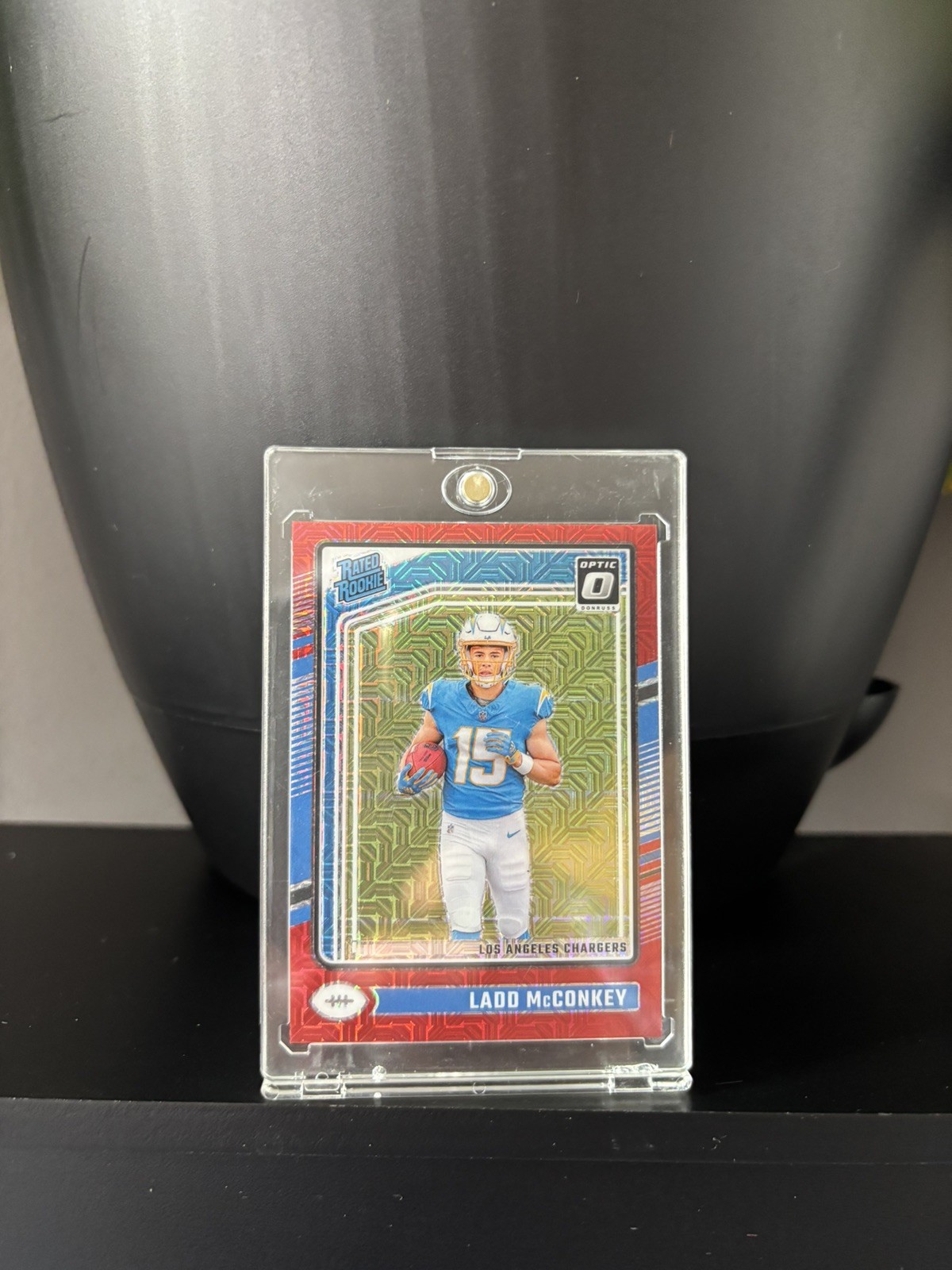 2024 Panini Donruss Optic Ladd McConkey Red Mojo Rated Rookie #266 Chargers