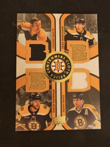 2023-24 Boston Bruins Centennial Cloth Quad Relics Bucyk/Marchand/Oates/Pasta