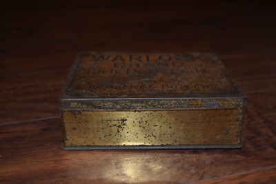 D14- Warlock Brand Rich Dark Flake Tobacco Tin