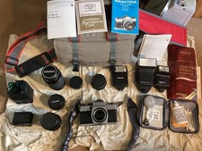 PRAKTICA MTL50 35mm slr camera comes with case 5 lenses 3 flashes
