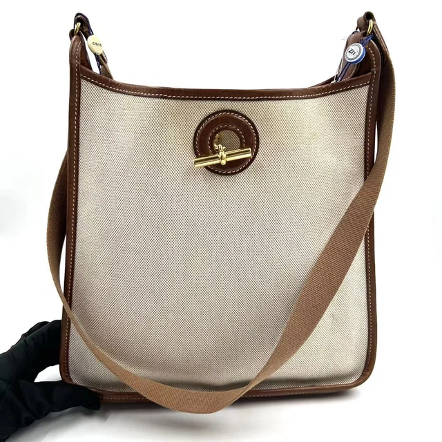11.01 16 Hermès Vespa Toile Shoulder Bag