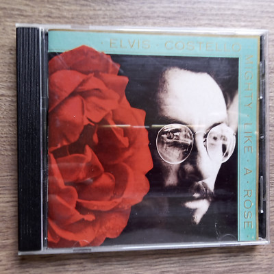 ELVIS COSTELLO - MIGHTY LIKE A ROSE (CD,) 1991