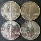Lot of Four 1987 $1 American Silver Eagle Dollars