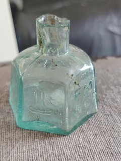 Aqua Glass Ink Bottle Hexagonal Shape Sheared Top F M & Co With Sword Design