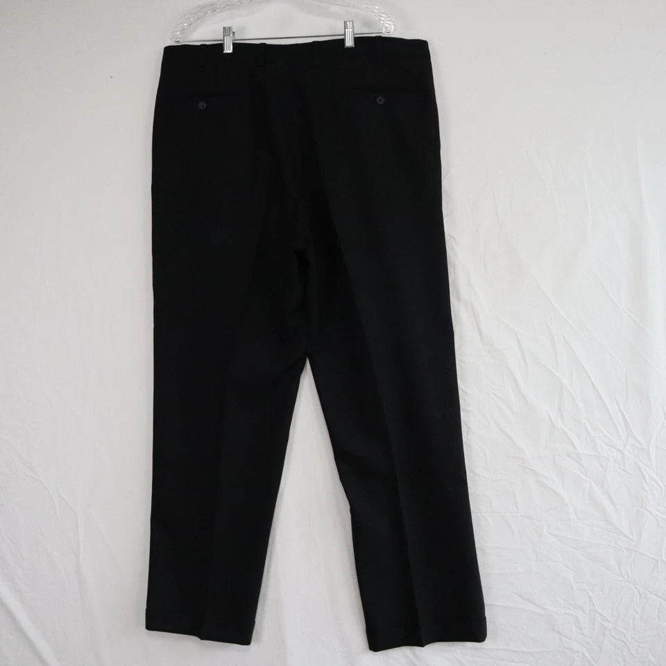 Pantalones de vestir de lana Linea Naturale para hombre 40 Super 110 con puños plisados negros Foto 2 de 4