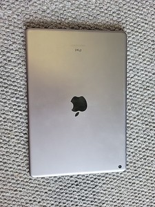 iPad Designed by Apple in California Model A2602 Assembled in China...