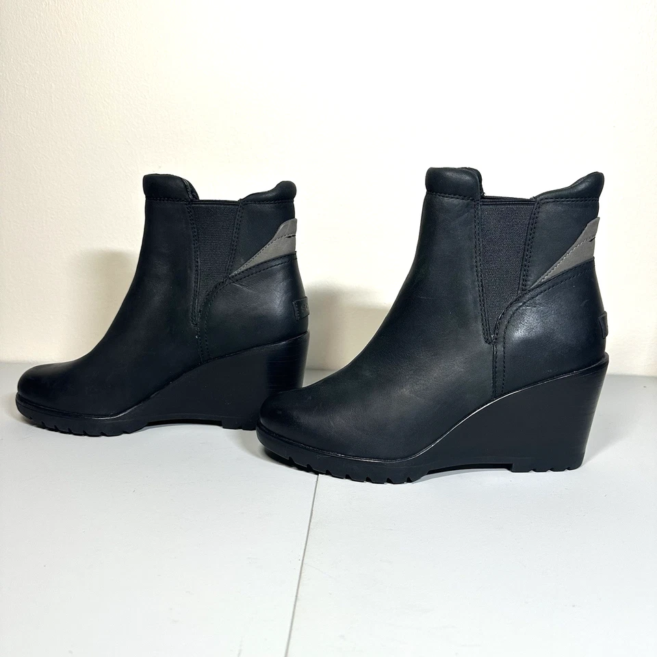 Botas de cuña al tobillo de cuero Chelsea Sorel After Hours impermeables para mujer talla 8 negras Foto 3 de 4