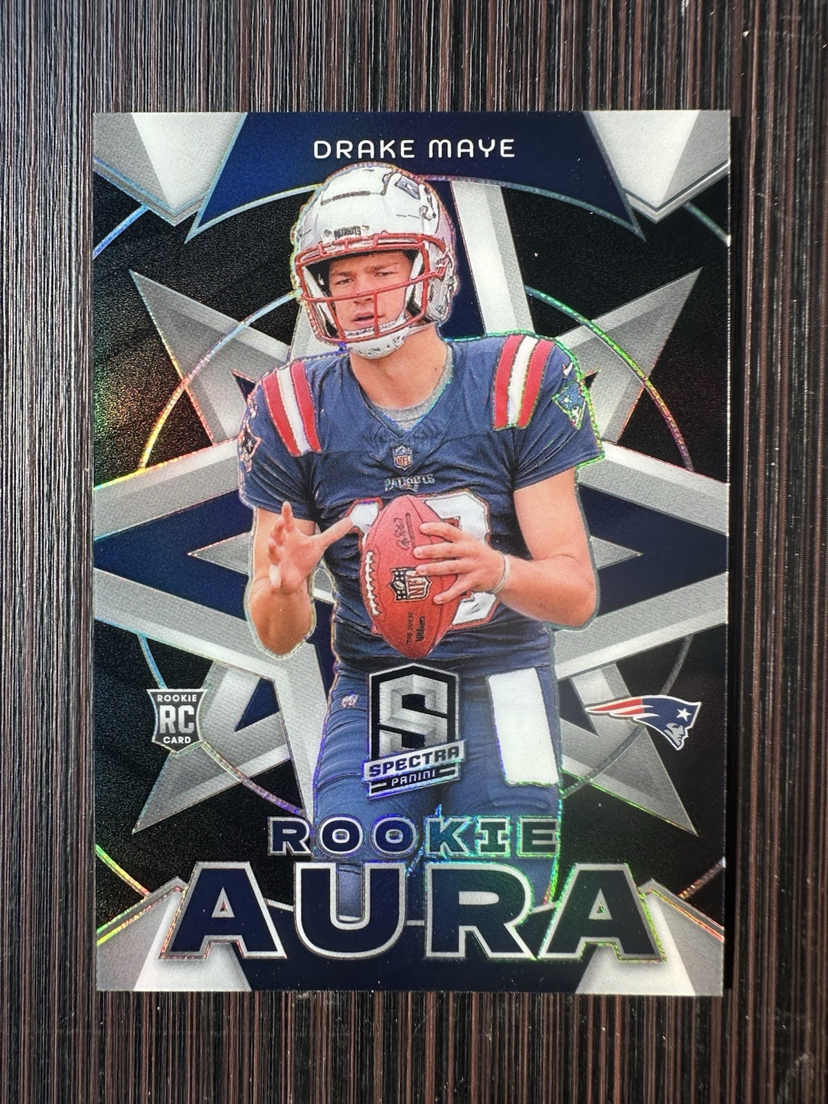 Drake Maye #RA-DME Football Cards 2024 Panini Spectra Rookie Aura trading card — raw and PSA graded price guide