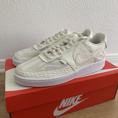 nike court vision low premium sneakers in sail white and aura
