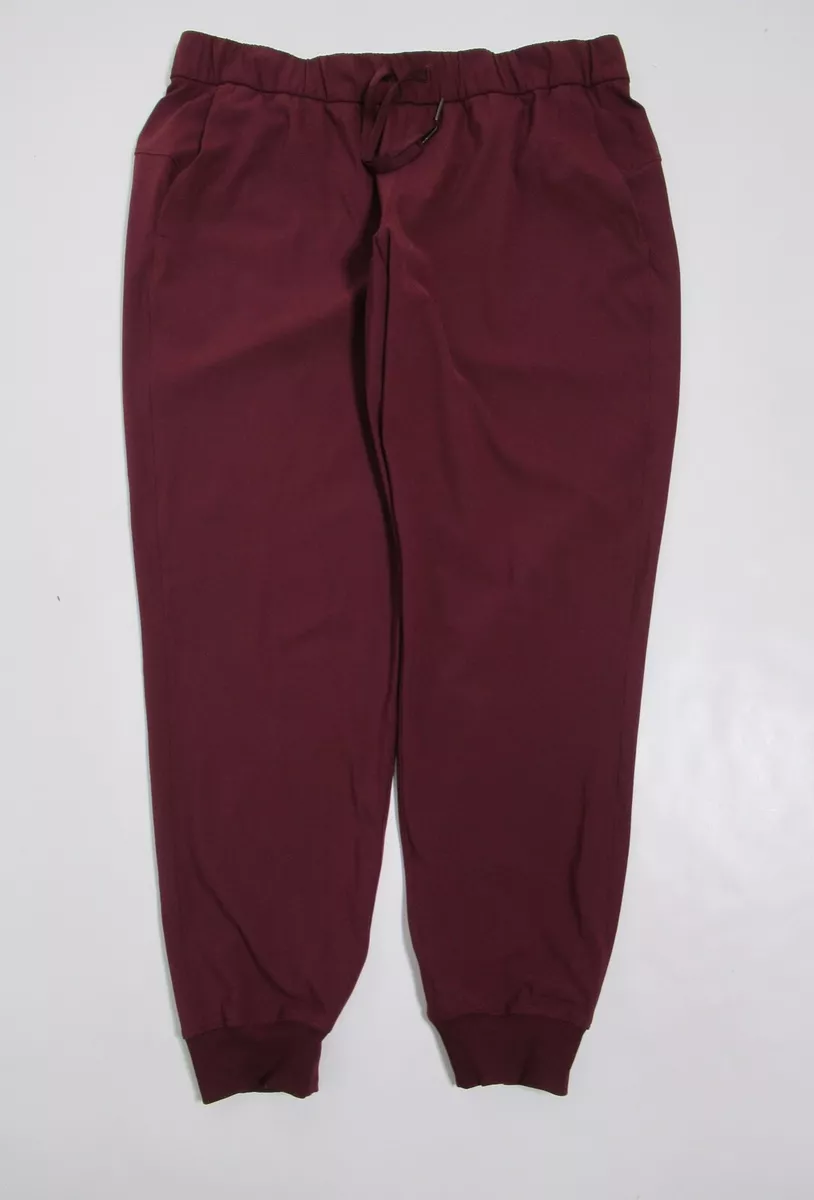 Lululemon Women's On the Fly Jogger *Luxtreme 28 Cassis Size 12  Sweat-Wicking