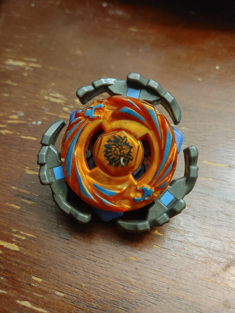 Orange Gray Beyblade with 3 fighting extending blades | eBay
